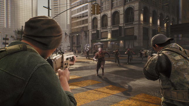 Los zombis corren hacia personas que portan armas en una intersección de la ciudad. 